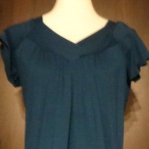 Dark Teal Short Sleeved Shirt Perception Concept